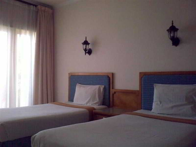 Pasific Beach Cottages Mangsit Exterior foto